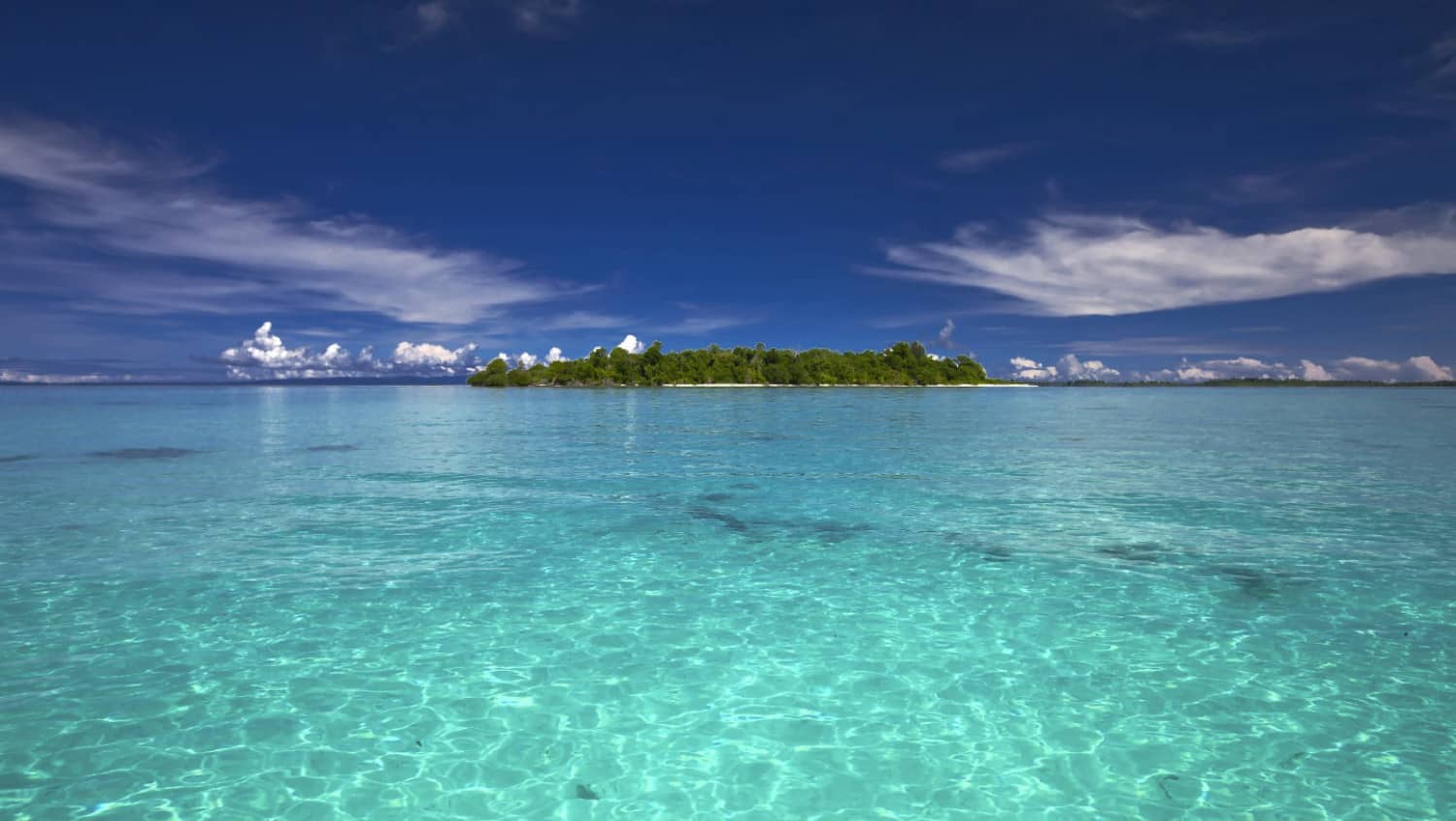Landscape of an island, a blue sky and crystal clear sea water