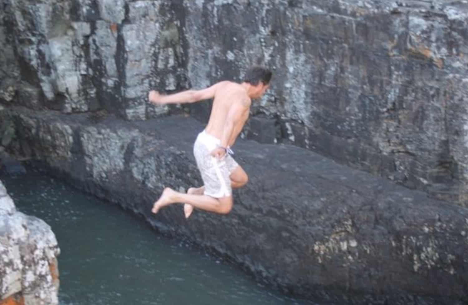 Guy cliff jumping