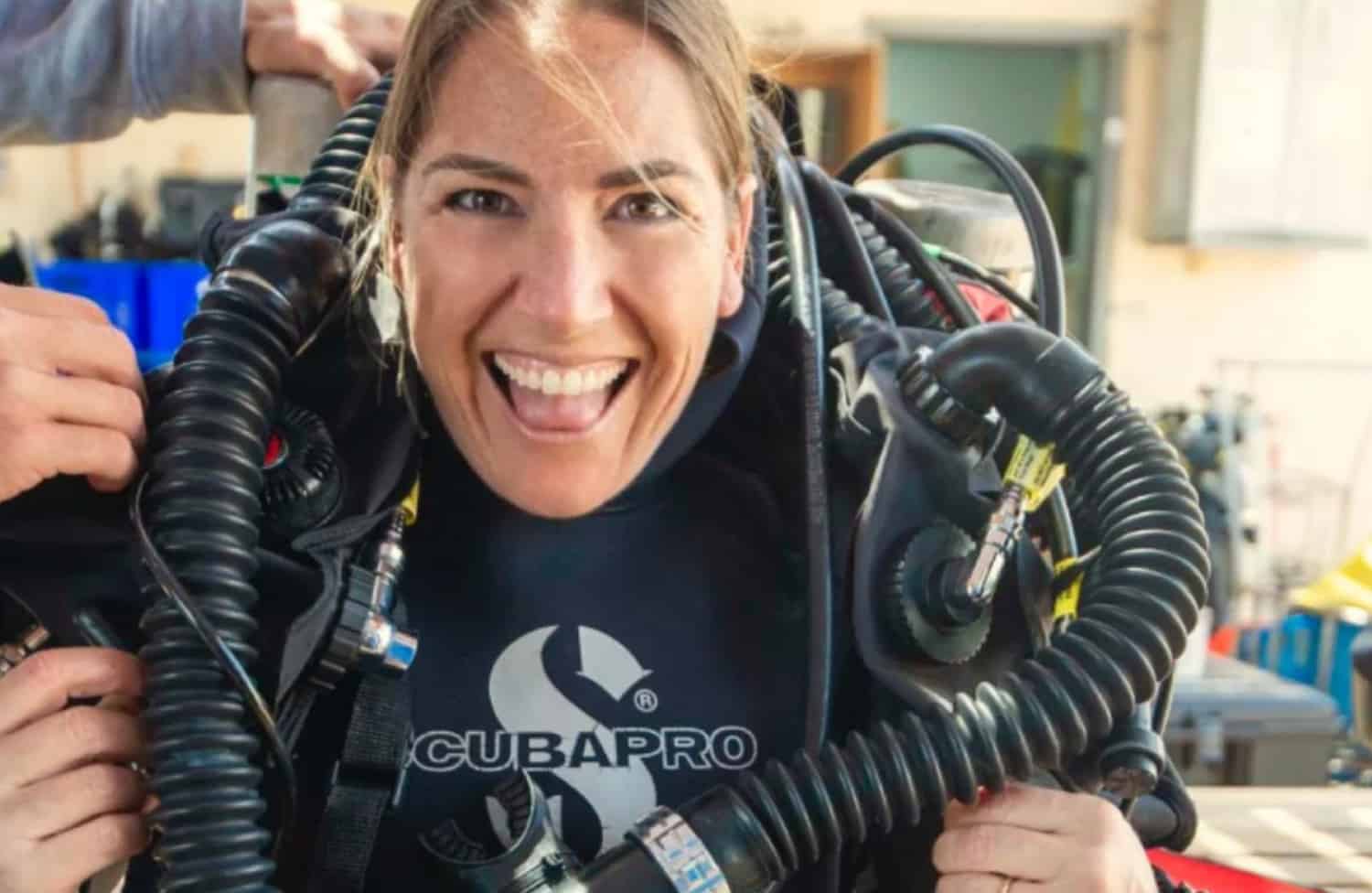 Smiling girl with snorkeling gears